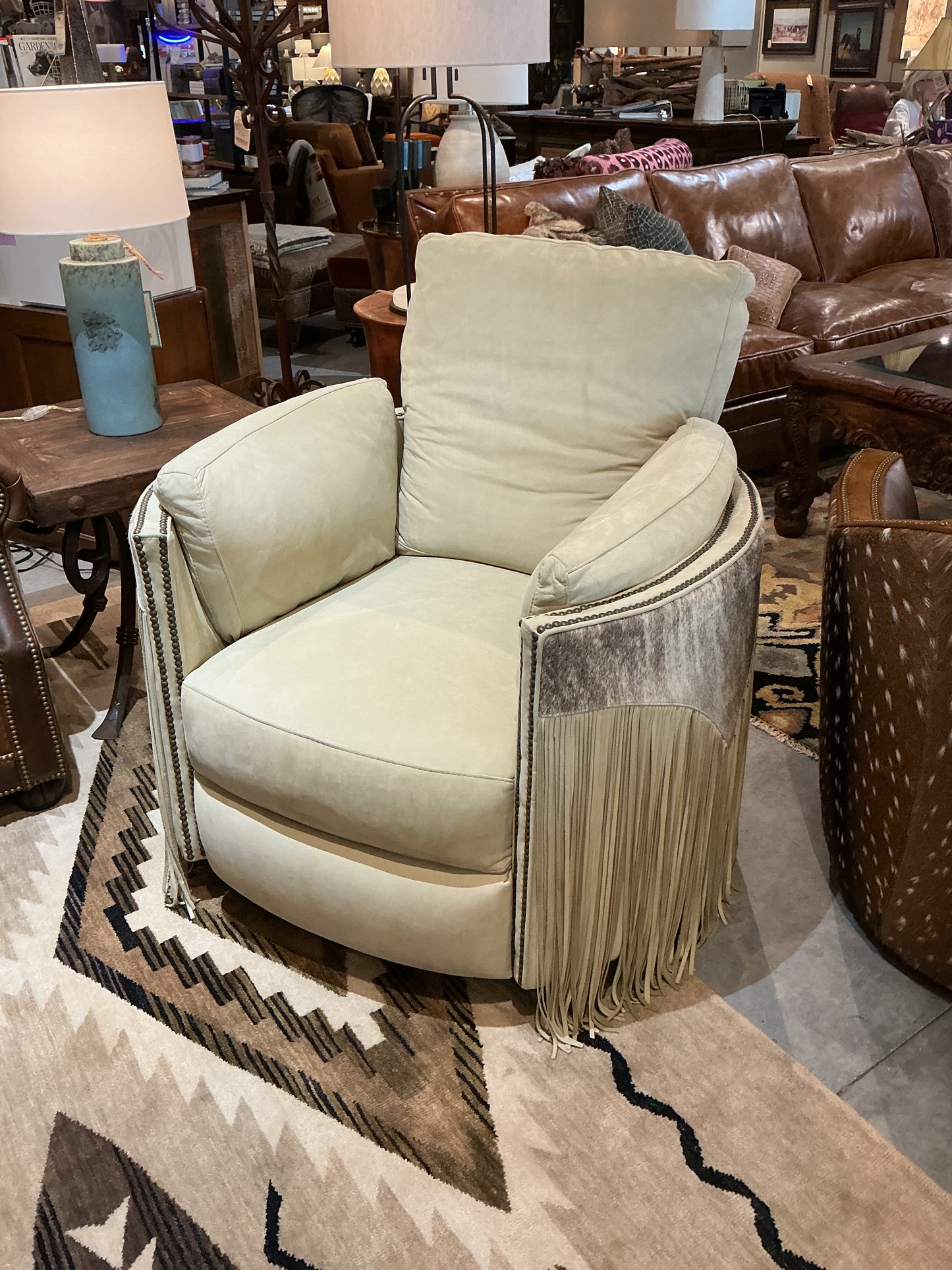 Falcon Snow Hair Hide Fringe Swivel Chair